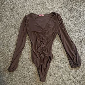 From a boutique , size L but is stretchy